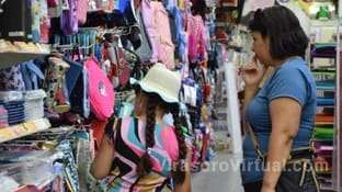 Comerciantes piden retrasar aumento salarial